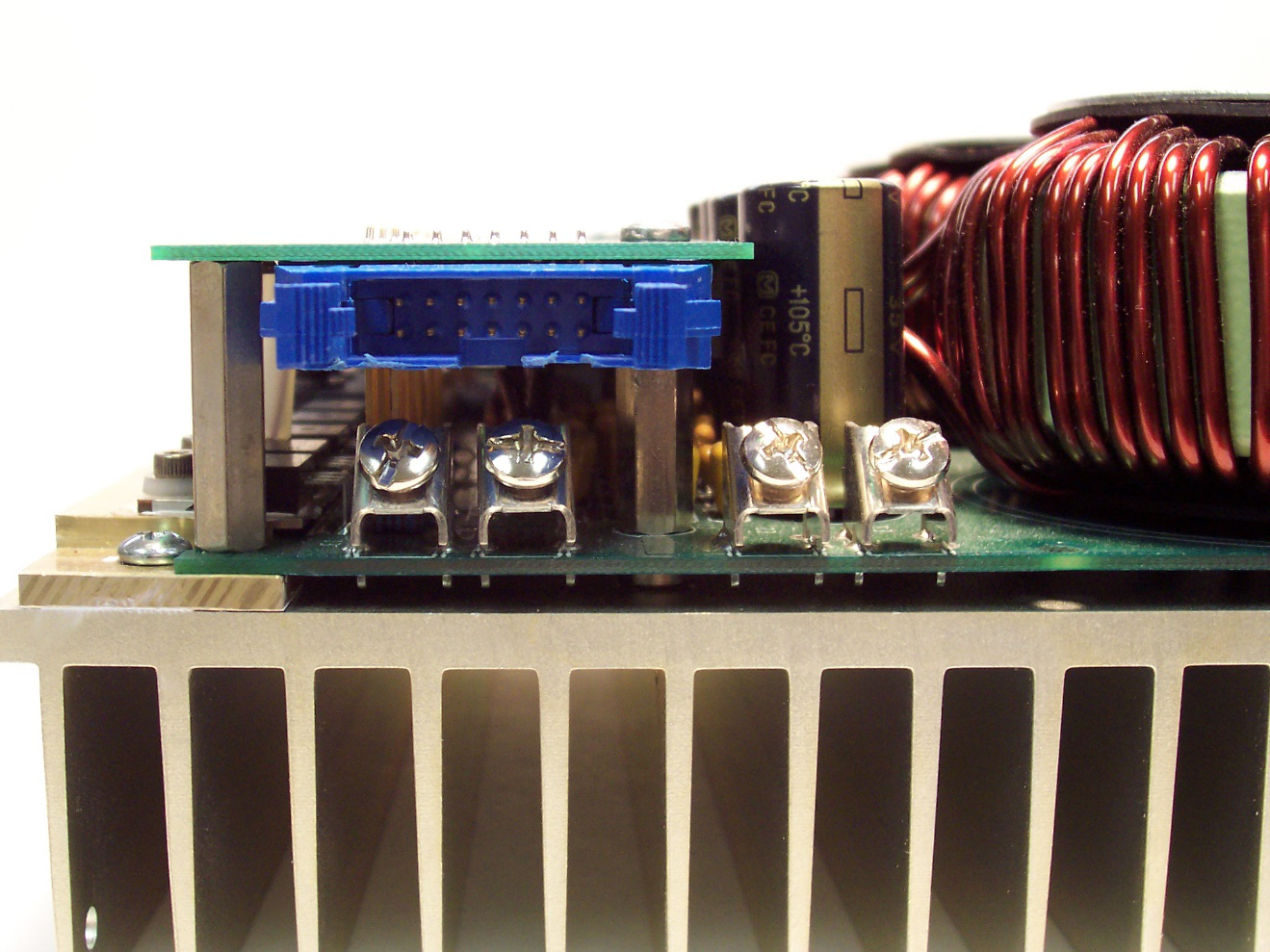 PCO-6131 photo identifying the J2 input header and the E1, E2, E3, and E4 screw-terminal locations on the main circuit board